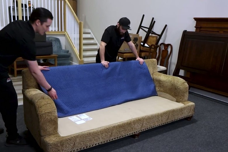 Blanket-wrapping a sofa